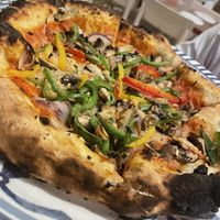 Vegetarian pizza - with mushrooms, peppers, onion and olives  at Tartufo Cucina Italiana in Athens