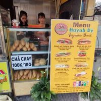 The lady on the right, she always has a big smile on her face. at Bánh Mì Chay Huynh Đệ  in Hoi An