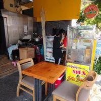 Not a fancy seating, but enough to sit comfortably compared with other street Banh Mi stalls. at Bánh Mì Chay Huynh Đệ  in Hoi An