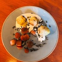 Grilled artichokes & balsamic braised radish served with vegan garlic yogurt & crispy capers   at Palmers Ale House And Kitchen in Spalding
