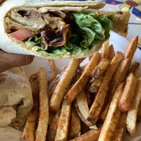Lebanese wrap and masala fries.  at Annapurna's World Vegetarian Cafe in Santa Fe