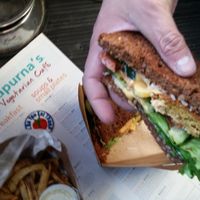 not a fan of cheese on a Falafel sandwich at Annapurna's World Vegetarian Cafe in Santa Fe