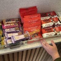 A selection of packaged vegan snacks near the till ☺️  at Grounds Cafe in Rugeley