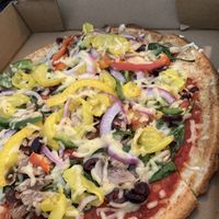 Cauliflower crust pizza with vegan cheese  at Crust Pizza Co in Baton Rouge