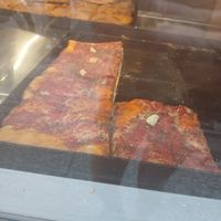 Square marinara pizza slices at Panificio Coppola Antonio in Naples