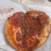 Round marinara pizza slices (€2) at Panificio Coppola Antonio in Naples