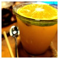 Orange tea sweetened with apricots  at Hoa Gom - Plant-Based Café & Vegan House in Da Nang