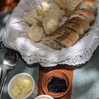 Cheese Bread and Baguette 
- accompanied with jam, vegan butter & hummus at Brunch da Mari Marola in Rio De Janeiro