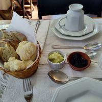 Cheese balls and bread with spreads at Brunch da Mari Marola in Rio De Janeiro