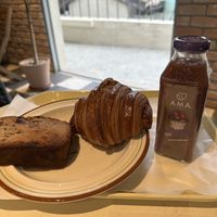 Vegan banana bread (left), plain croissant (middle), blueberry apple juice (right)  at Perment - 퍼먼트 in Seoul