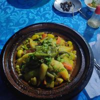 Vegetarian tajine (which is vegan) with beans, carrots, zucchini, potatoes, pears
Beware of the jalapeño its superhot for my european taste :) at Azilal - مقهى أزيلال in Marrakech