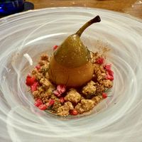 Organic roasted pear with saffron and star anise and Mallorcan almonds, orange and pink pepper crumble  at Bistro Esencia in Mallorca