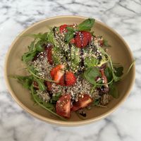Quinoa, strawberry, rocket, tomatoes salad with pickled onions and a balsamic dressing.  at VERDE in Malmo