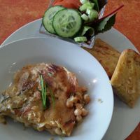 vegan chickpea and courgette lasagne served with salad and garlic bread - £5 - brilliant value, lovely creamy sauce! at Little Phatisserie in Bexhill