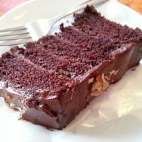 Rich, moist, five-layered vegan chocolate cake. Delicious! at Little Phatisserie in Bexhill