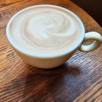 Oatmilk cappuccino at Müller & Egerer Bäckerei Konditorei - Domsheide  in Bremen