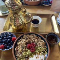 Pistachio yoghurt bowl (coconut yoghurt bowl in background)  at Shako Mako Cafe in Norwich