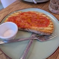 Tomato and olive oil toast at Kafeteros in Santander