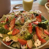 Salad with turmeric latté  at Nest Plant Based Bistro in Berlin
