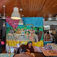 Funky art adorns the dining room and bathroom at Comfortland in Astoria