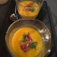 Mango puree with rum topped with pomegranate and chopped mint.  at MEZZE in Granada