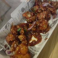 Alitas de coliflor con salsa buffalo at MEZZE in Granada