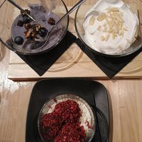 Blueberry and lavender pudding, lemon pudding and chocolate truffles with pink pepper and popcorn  at MEZZE in Granada