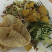 my plate with everything combined- roti, potatoes, rice and veggies at Indo Restaurant in Noord