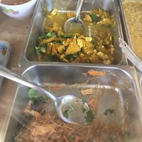 Whatever that was in the back was so sweet, it was delicious !! at Somkid Vegetarian in Krabi