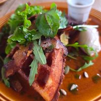 Cheesy waffles with seitan bacon at Essential Vegan Cafe in East London