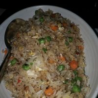 vegan fried rice however they added eggs  at Wild Ginger in Seattle