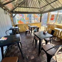 Protected outdoor seating (no seating inside)  at ChuMinh Tofu and Vegan Deli in Seattle