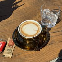 Coffee with oat milk   at Golden Buddha in Ibiza