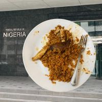 Meal plated at home, superposed over Nigerian embassy (the truck is parked right in front of embassy) at DF Nigerian Food Truck in New York City