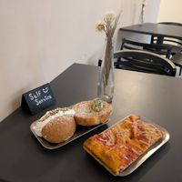 Pizza slice and two pistachio-filled pastries at The Sanctuary - PBerg in Berlin