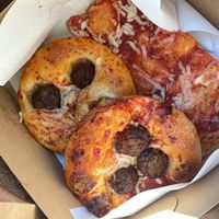 Pizza margherita and pizza with meat balls  at The Sanctuary - PBerg in Berlin