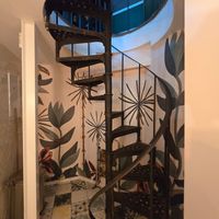 Very narrow and steep spiral stairs to toilets at Vegan Chouke in Brussels