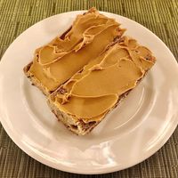 Toasted wholemeal baguette with peanut butter  at Mistral  in Dubai