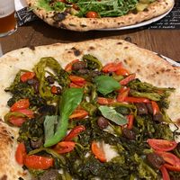 Friarielli, pomodorini, olive, basilico at Bella Vita Pizzeria  in Asti