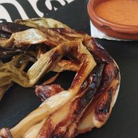Calçots com a primer del menú at El Racó de la Paella in Torredembarra