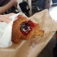 Vegan croissant with berry jam filling at Tentazioni Café in Florence