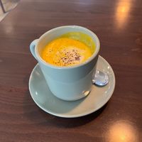 Golden milk with plant milk at Tat's in Pristina