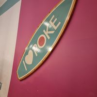 Sign logo on wall at I Love Poke in Rome