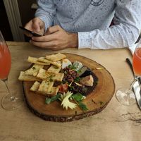 Every time we come here, I make sure to get the cheese platter. It is not often that you can go to a restaurant and enjoy a cheese platter as a vegan, so I make sure to indulge when I am here! The fig jam is to die for! at Mike's Cafe and Wine Bar in San Juan Island