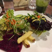 Salad with burger, amazing beetroot patty !!! at GreenWoods Raw Cafe in Kowloon