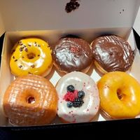 My choices. They are all very good. The Compassion Fruit and the Strawberry Lab are super good. (Strawberry Lab on lower left corner). at Donut Friend - Highland Park in Los Angeles