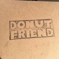 Cool logo on the box at Donut Friend - Highland Park in Los Angeles