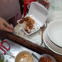 Preparing my take away at Quán Chay 101 in Ho Chi Minh City