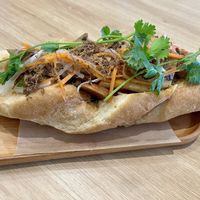 Bánh mì with vegan sausage and ham  at LIKE COFFEE - Happy Garden in Cat Ba