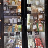 Fridge with different types of “meat”. There is much more in the front counter.   at Die Vegane Fleischerei in Berlin